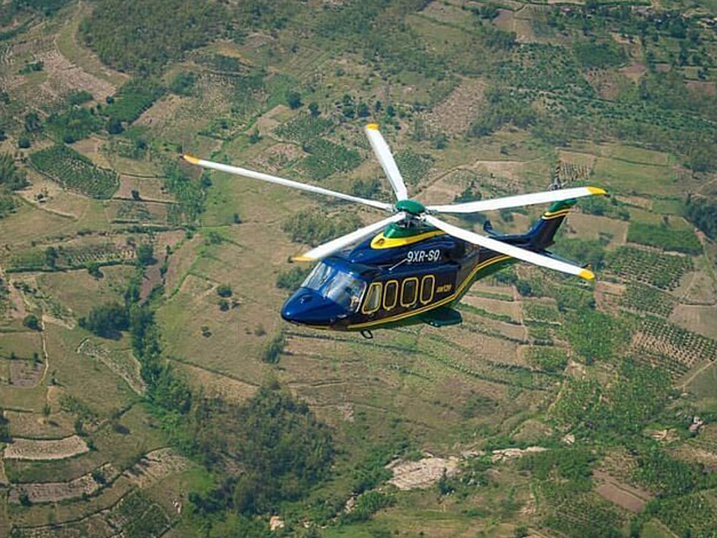 Aerial view of one of the helicopters in flight, part of your experience on Akagera Helicopter Safari